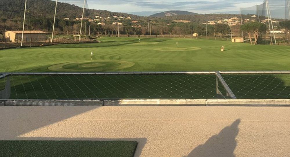 Austin Synthetic turf beside natural grass golf course