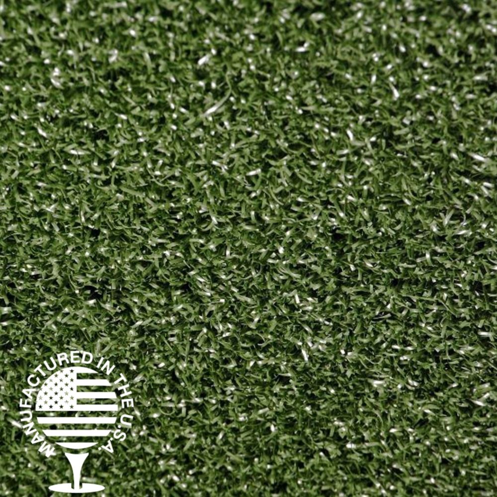 A close up of fake grass with a manufactured in the USA logo.